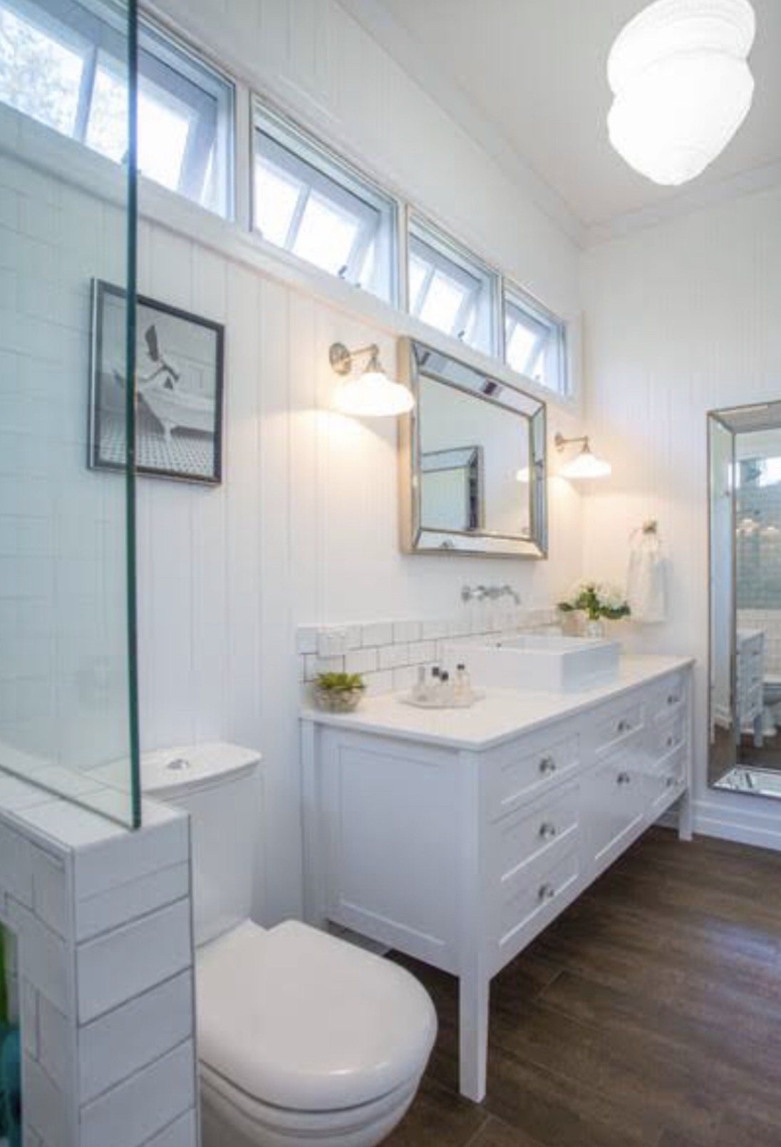 Bright bathroom under high windows